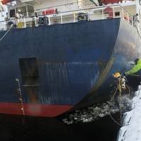 Hydrex diver taking the plunge in icy conditions in Finland. (Photo: Hydrex)