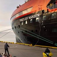 Ice breaks against the hull as battery-hybrid MS Fridtjof Nansen was named in a ceremony at home in Longyearbyen, Svalbard. (Photo: Espen Mills/Hurtigruten Expeditions)