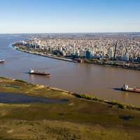 Illustration only - Aerial shot over Parana River in Front of Rosario City - Credit: Wirestock/AdobeStock