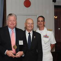 John Artzen, Chairman of the U.S. Merchant Marine Academy (USMMA) Alumni Association (far left), Rear Admiral Mark H. Buzby, USN, Ret., Maritime Administrator (third from left), and Rear Admiral James Helis, USMS, USMMA Superintendent (far right), present the Outstanding Professional Achievement Award to Robert Clyne, ABS Senior Vice President, General Counsel and Corporate Secretary. Photo: ABS