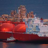 LNG Helper: Gas carrier Arctic Princess helped by a tug at Melkoya, Norway.