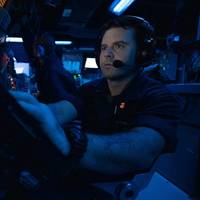 Lt. j.g. John Galvin monitors aircraft activity near the Arleigh Burke-class guided-missile destroyer USS Laboon (DDG 58) while the ship operates in support of Operation Prosperity Guardian (OPG) in the Bab al-Mandeb, Dec. 30, 2024. (Source: US Navy)