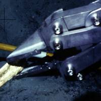 Manipulating recovery of a gold bar: Image courtesy of Odyssey Marine Exploration