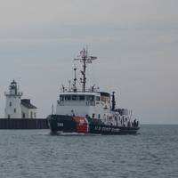 Morro Bay passes the Cleveland West Pierhead Light in June 2013. (USCG photo by Christopher M. Yaw)