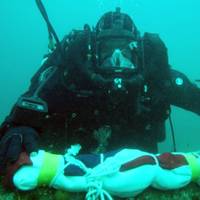 Naval divers return to the wreck of HMS Royal Oak to replace her White Ensign (Photo: UK Royal Navy)