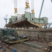 Newport News shipbuilders added a 965-ton structure comprising two pump rooms to the nuclear-powered aircraft carrier John F. Kennedy (CVN 79) earlier this month. This is the 21st superlift that has been placed in the dry dock since the ship’s keel was laid in August 2015. (Photo by John Whalen/HII)