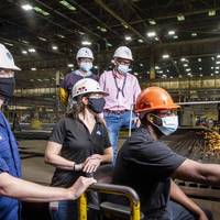Ingalls shipbuilder Jason Jackson starts fabrication of steel for the newest Legend-class national security cutter Friedman (NSC 11). Also pictured, from left, are Cmdr. Christopher Lavin, acting commanding officer, PRO Gulf Coast; Amanda Whitaker, Ingalls NSC ship integration manager; and Dianna Genton and Braxton Collins, Ingalls hull superintendents. (Photo: Derek Fountain / HII)
