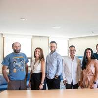 Nikos Psaltopoulos (fourth from left) with MarineTraffic team. Photo: MarineTraffic