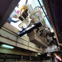 One of the new engines is lowered into the engine room. Image courtesy Cummins/Thai Marine Department