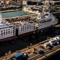 One of the vessels, Star Breeze, undergoing renovation in Palermo, with a new 25.6 meter (84 feet) section being added in the middle. (Photo: Fincantieri)