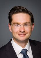 Parliamentary Secretary to the Minister of Transport, Infrastructure and Communities, Pierre Poilievre.