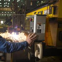 Paul Bosarge, a burner specialist workleaderman at Ingalls Shipbuilding, initiates a cut of steel on the National Security Cutter Kimball (WMSL 756) using the Avenger 3 Plasma cutter (Photo by Andrew Young/HII)