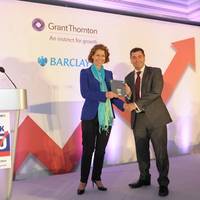 Peel Ports chief executive Mark Whitworth receiving the Sunday Times Grant Thornton Top Track 250 award from Grant Thornton UK chief executive Sacha Romanovitch