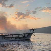 Photo of Conception’s burned hull at dawn on Sept. 2, 2019, prior to sinking. (Credit: Ventura County Fire Department)