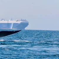 Photo: The combination of high cargo ship traffic, feeding areas and migratory whale routes result in a marked increased risk of ship strikes to whales that can result in serious injury or death to whales. (Credit: John Calambokidis/Cascadia)