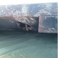 Photos of damage to the barge CBC 7026 and barge TTI-150 after they collided near mile marker 341 in the Intracoastal Waterway, Dec. 23, 2013. U.S. Coast Guard photo.  