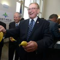 Port of New Orleans President and CEO Gary LaGrange hands out Chiquita Bananas following the brand's announcement to return its shipping operations to the Port of New Orleans . Pictured from left are Joe Accardo, Executive Director of the Ports Association of Louisiana, Port Commissioners Robert Barkerding, Jr. and Michael Kearney, and LaGrange.