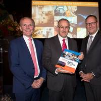 Presentation of the anniversary book A Century Radio Holland during the festive celebration of the 100th anniversary of Radio Holland on board of the ss Rotterdam. From left; Paul Smulders (CEO Radio Holland Group), Ing. A. Aboutaleb (Mayor of Rotterdam), Erik van der Noordaa (CEO RH Marine Group) and Ben Vree (Chairman of the supervisory board of RH Marine Group). (Photo: Radio Holland)