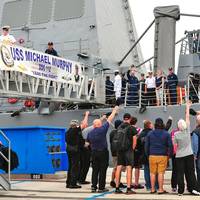 Protecteur civilians cheer USS Michael Murphy: Photo credit USN