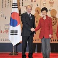 Putin & Park shake hands: Photo courtesy of the Russian Federation