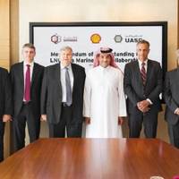 Qatargas CEO Khalid bin Khalifa Al Thani (fifth left), United Arab Shipping Company CEO Jorn Hinge (fourth left), and Managing Director and Chairman of Qatar Shell Companies, Michiel Kool (sixth left) along with other officials after the signing ceremony. Photo: Qatargas