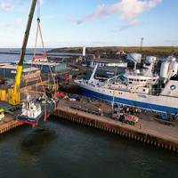 Réalt na Farraige, built by Dales Marine Services, as it was lowered into Aberdeen harbor. Photo courtesy Dales Marine