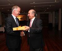 Ray Pomfret and Mathew Los, Chairman of the Greek Group, at the Yacht Club of Greece in Athens exchanging gifts.
