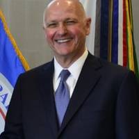 Rear Adm. Paul Thomas shakes hands with Captain Blaine Collins, DNV GL vice president of group governmental and public affairs for the U.S., following the signing of the new memorandum of agreement. Photo: DNV GL