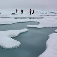               Researchers working on the Chukchi Sea in 2010 (photo courtesy of NASA/Kathryn Hansen)