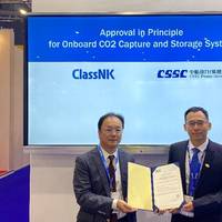 Right: Mr. Dai Qun, Deputy Section Chief / Senior Engineer, CPGC
Left: Mr. Hayato Suga, Executive Vice President, ClassNK
 - Credit: ClassNK