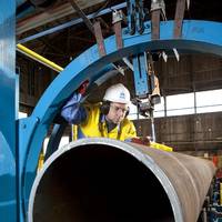 Robert Instone prepares cutting tool to produce section for offshore wind turbine foundation