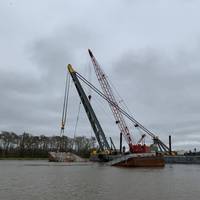 Rock barge ACL 01700 split in half and sunk after grounding near Mile Marker 99 in Berwick, La. earlier this week. Salvage operations have continued day and night. (Photo Alexandria Preston / U.S. Coast Guard)