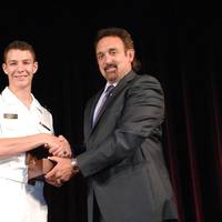 Northrop Grumman Corporation presented the 2014 Elmer A. Sperry Junior Navigator of the Year Award to Midshipman Robert Francisco Yerkes-Medina in ceremonies at the U.S. Naval Academy. The award was presented by Jeff Holloway (right), director of the company's Charlottesville, Virginia, campus and an academy graduate. (Photo courtesy of Northrop Grumman)