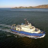 R/V Neil Armstrong sails into San Francisco Harbor at the conclusion of the first leg of its inaugural voyage in late 2015. (Image by Aerial Productions, ©Woods Hole Oceanographic Institution)