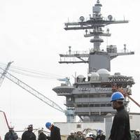 Sailors signal steam catapult systems testing aboard the aircraft carrier USS Abraham Lincoln (CVN 72). Lincoln is in its final stages of testing all of its steam-powered systems as part of its refueling and complex overhaul (RCOH). (Photo: John Whalen/HII)