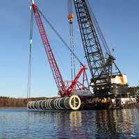 Salvage of a 485-ton, 140-foot long stainless steel reactor vessel that rolled off a barge.