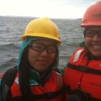 Scholarship winners Ariel Zhou (left) and Caiti Campbell (right) aboard Crolwey's tug, Guardsman