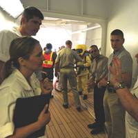 Scott Elphison, senior marine inspector for the Coast Guard Cruise Ship National Center of Expertise, addresses students and fellow instructors in a cruise ship inspection on Oct. 31, 2009. The lesson was part of an Advanced Foreign Passenger Vessel Examination course.