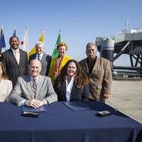 (Seated, from left) Kim Ostrowski, Director of the Navy Base Realignment and Closure Program Management Office West; Maritime Administrator Paul “Chip” Jaenichen; Harbor Commissioner Tracy Egoscue; (standing, from left) Richard Cameron, Port Managing Director of Environmental Affairs and Planning; Long Beach Vice Mayor Rex Richardson; Port CEO Jon Slangerup; former Long Beach Mayor Beverly O'Neill; and Long Beach Councilmember Roberto Uranga, District 7.)