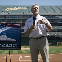 Secretary of the Navy (SECNAV) Ray Mabus announces the name of the Independence-class littoral combat ship LCS 24 as USS Oakland during a major league baseball game between the Oakland Athletics and Los Angeles Dodgers. (U.S. Navy photo by Armando Gonzales)