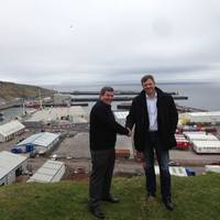 Shaking hands on a trailblazing agreement – Hugh Simpson, left, and Knut Magne Johannessen at Scrabster Harbour
