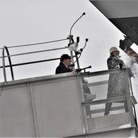 Ship sponsor Jill Donnelly breaks a bottle of champagne across the bow during the christening ceremony for the nationâs 17th Littoral Combat Ship, the future USS Indianapolis , at the Fincantieri Marinette Marine shipyard on April 14. Photo: Lockheed Martin