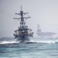 Ships from the George H.W. Bush Carrier Strike Group simulate a strait transit in the Atlantic Ocean, Dec. 10, 2013. The strike group was conducting a pre-deployment evaluation. (U.S. Navy Photo by Justin Wolpert)