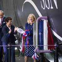 Ship's sponsor Jill Biden reacts after christening the submarine Delaware (SSN 791). Also pictured (left to right) are Cmdr. Brian Hogan, the submarine's commanding oficer; Sen. Thomas Carper, D-Del.; and Newport News Shipbuilding President Jennifer Boykin. Photo by John Whalen/Huntington Ingalls Industries