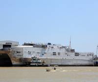 The 338-foot-long aluminum catamarans are designed to be fast, flexible and maneuverable even in shallow waters, making them ideal for transporting troops and equipment quickly within a theater of operations. (U.S. Navy photo Courtesy Austal USA/Released) 