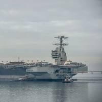 The aircraft carrier Gerald R. Ford (CVN 78) was moved Sunday to Newport News Shipbuilding's Pier 3, where it will undergo additional outfitting and testing for the next 28 months. Photo by Chris Oxley