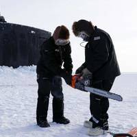 The Arctic region has become an area of intense geopolitical interest and competition. Field technicians assigned to the Arctic Submarine Laboratory prepare to remove ice from the Los Angeles-class attack submarine USS Hampton (SSN 767) at Ice Camp Whale on the Arctic Ocean, during Operation Ice Camp (ICE CAMP) 2024. ICE CAMP is a three-week operation that allows the Navy to assess its operational readiness in the Arctic, increase experience in the region, advance understanding of the Arctic env