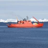 The Aurora Australis two kilometers off station on a clear sunny day at resupply (Photo: Colin)
