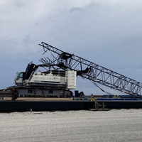 The boom bent backwards over the cabin after striking the bridge. (Source: U.S. Coast Guard)