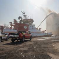 The Coast Guard, Port Authority of New York and New Jersey, Newark Fire Department, and multiple state and area agencies respond to a fire in Port Newark on the vehicle carrier ship, Grande Costa D’Avorio. Fire fighting crews are working to extinguish the fire both from the pier and from FDNY fireboats. (U.S. Coast Guard photo by Dan Henry)